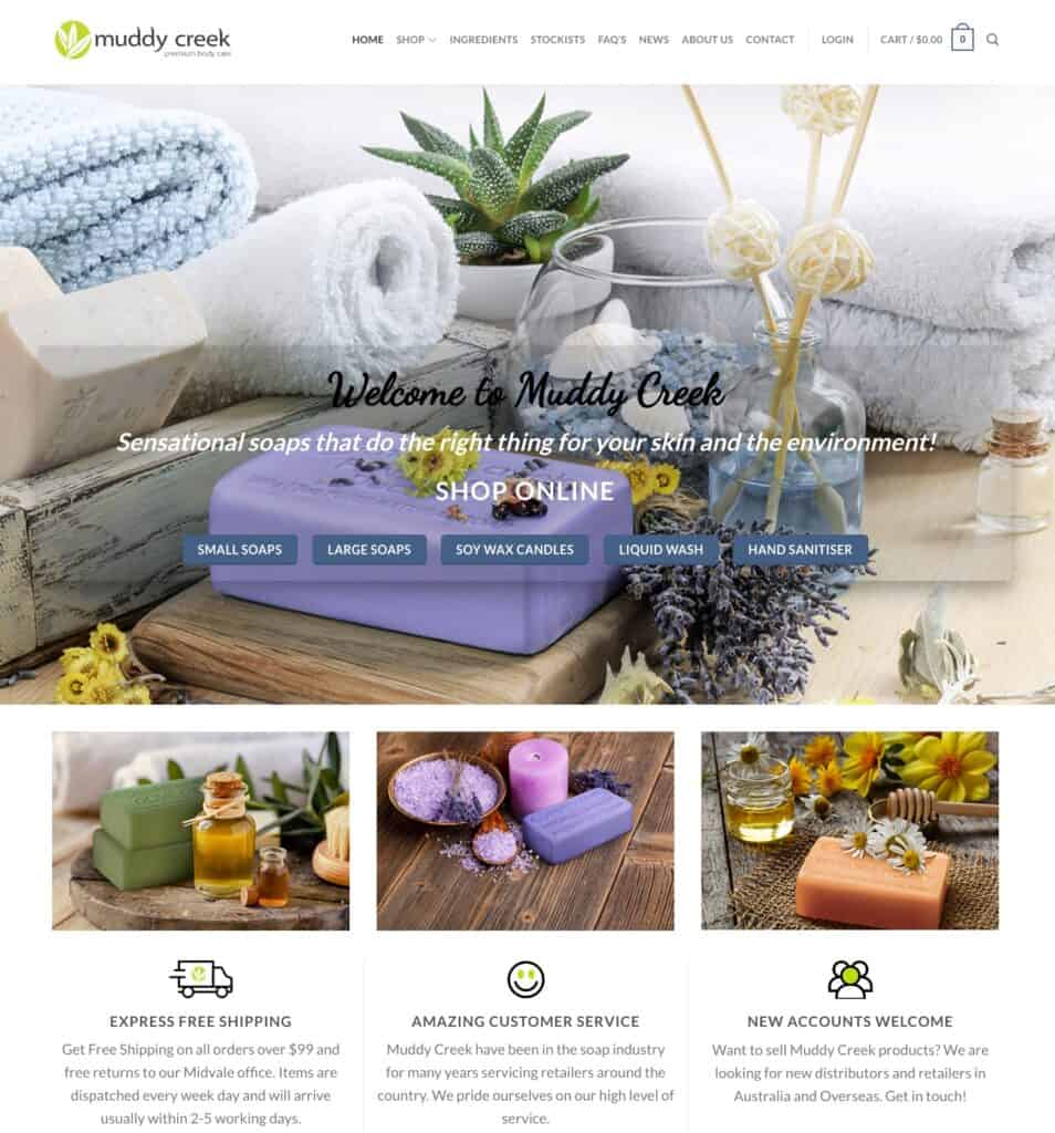 Display of natural soaps, bath towels, and spa products for skincare.